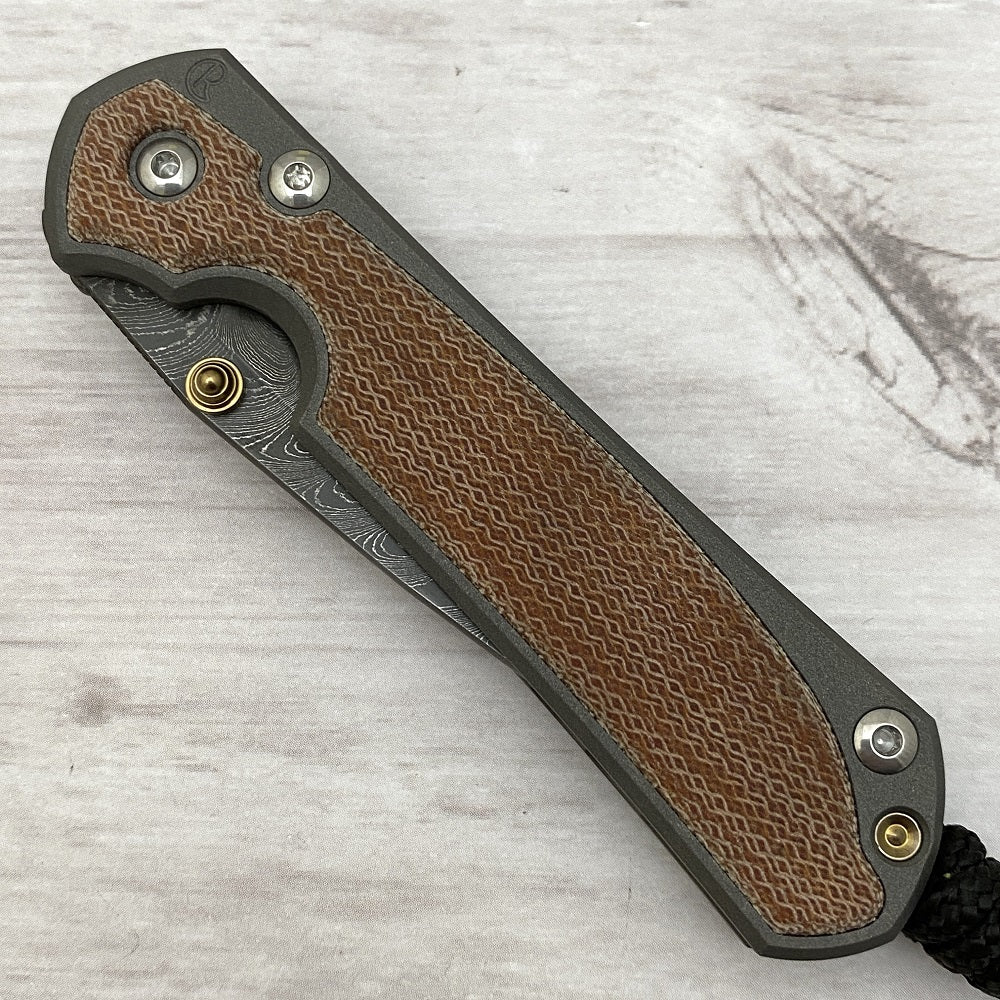 CHRIS REEVE SMALL SEBENZA 31 NATURAL CANVAS MICARTA INLAY - BOOMERANG BLADE - GOLD DOUBLE THUMB LUGS