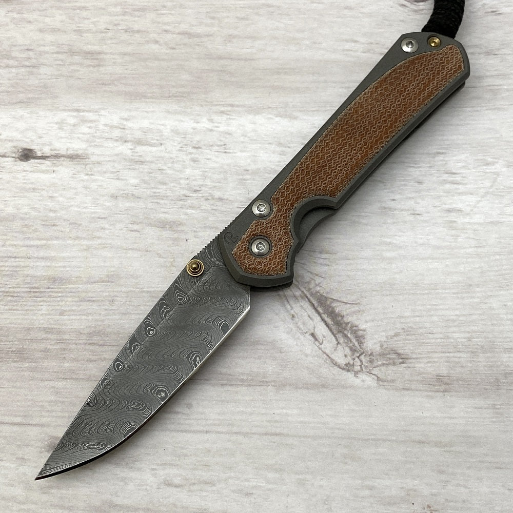 CHRIS REEVE SMALL SEBENZA 31 NATURAL CANVAS MICARTA INLAY - BOOMERANG BLADE - GOLD DOUBLE THUMB LUGS