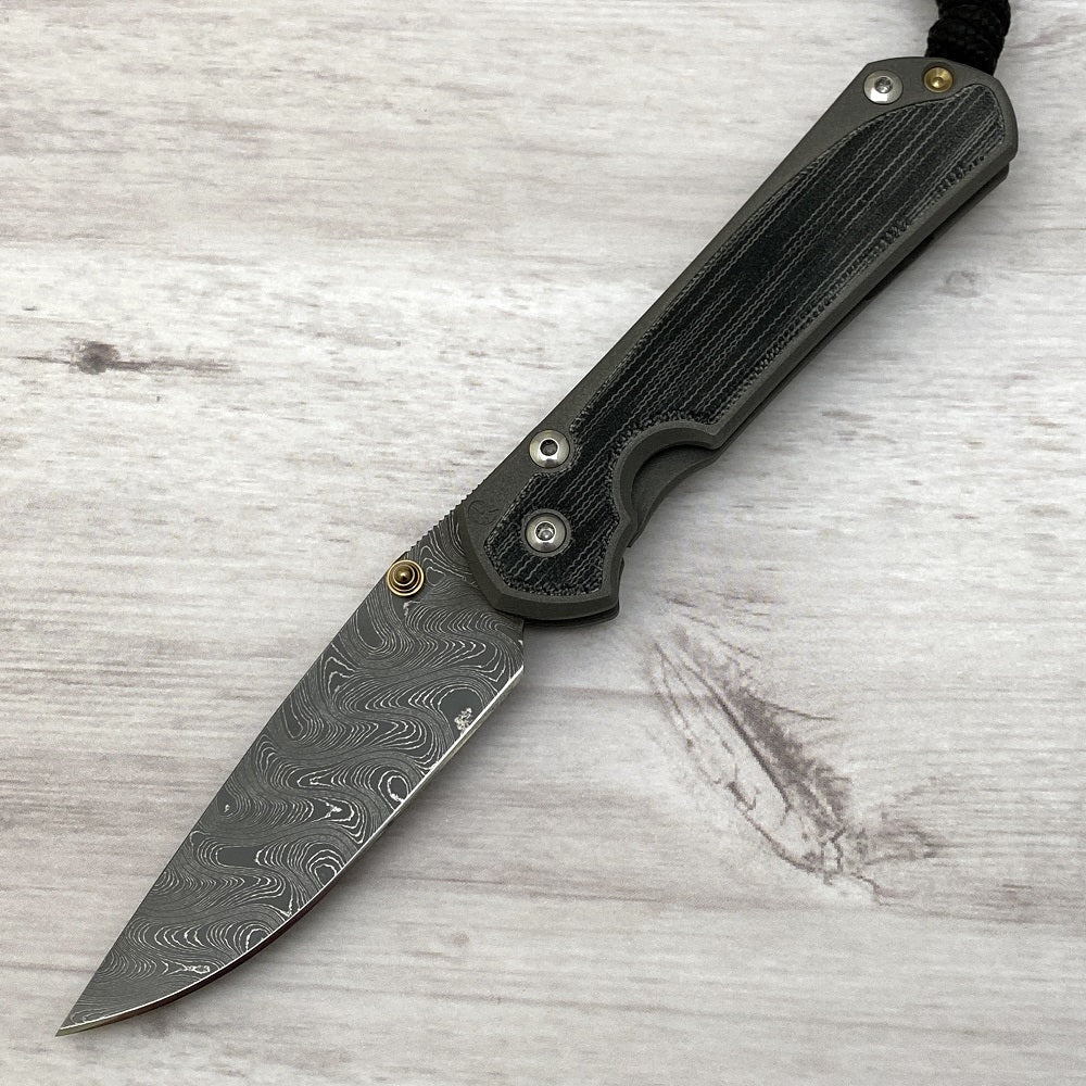 CHRIS REEVE SMALL SEBENZA 31 BLACK CANVAS MICARTA INLAY - BOOMERANG BLADE - GOLD DOUBLE THUMB LUGS