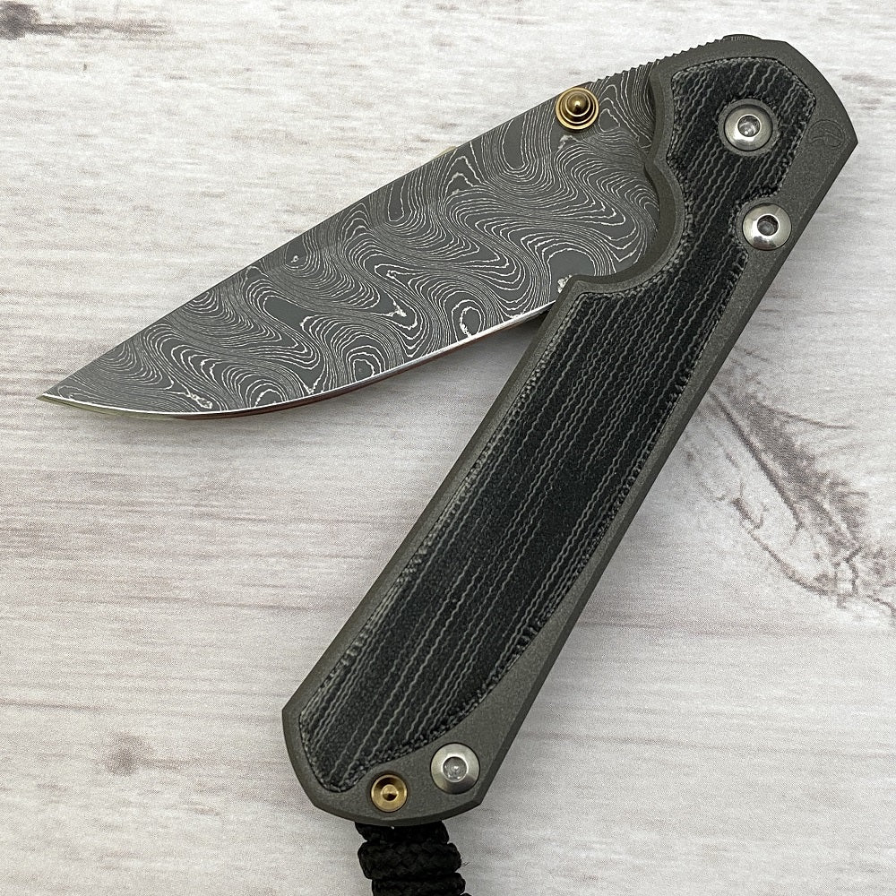 CHRIS REEVE SMALL SEBENZA 31 BLACK CANVAS MICARTA INLAY - BOOMERANG BLADE - GOLD DOUBLE THUMB LUGS