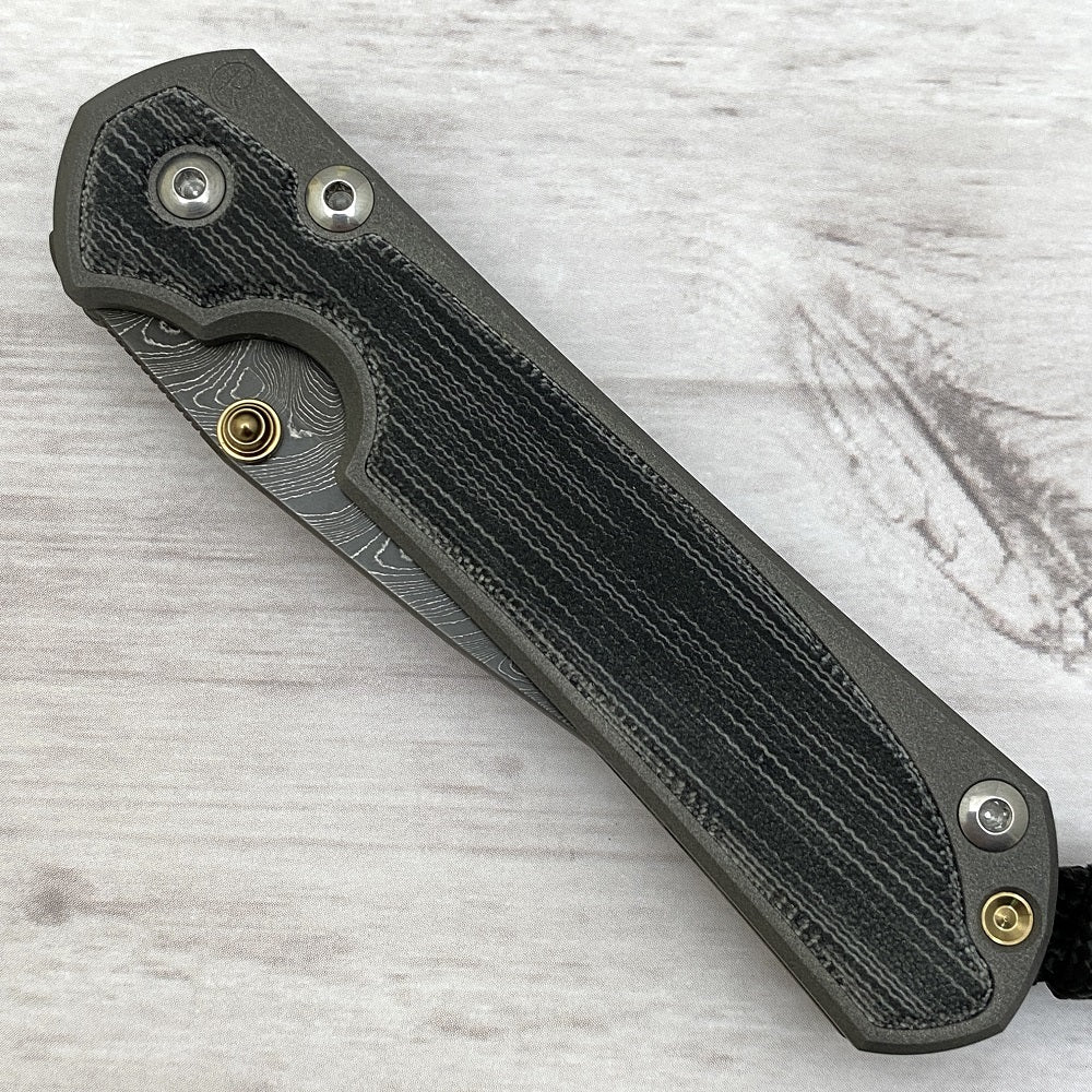 CHRIS REEVE SMALL SEBENZA 31 BLACK CANVAS MICARTA INLAY - BOOMERANG BLADE - GOLD DOUBLE THUMB LUGS