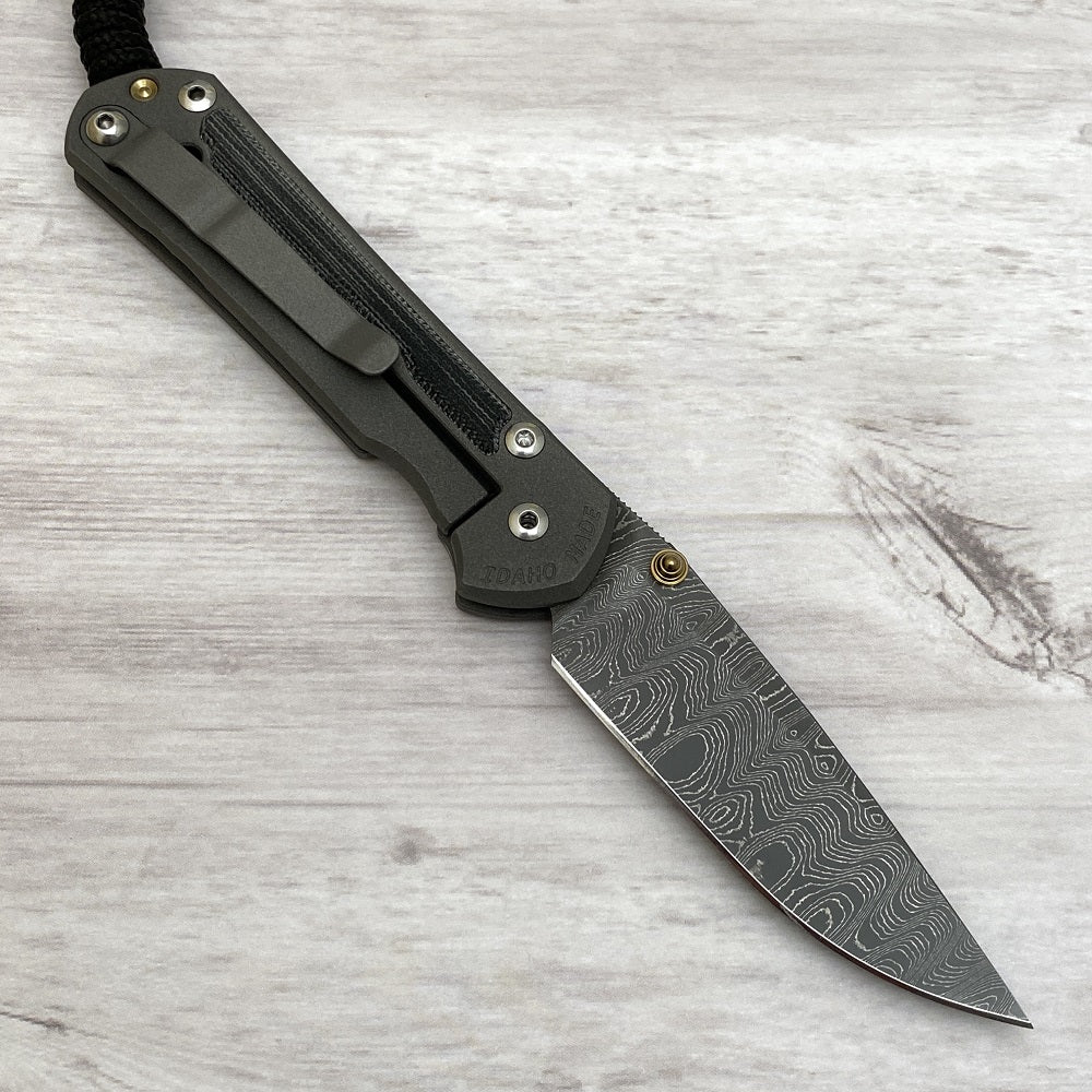 CHRIS REEVE SMALL SEBENZA 31 BLACK CANVAS MICARTA INLAY - LADDER BLADE - GOLD DOUBLE THUMB LUGS