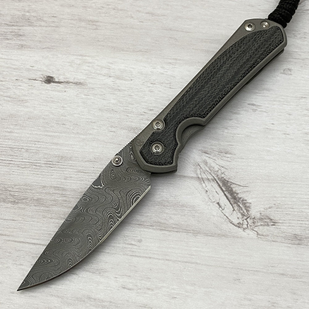 CHRIS REEVE SMALL SEBENZA 31 BLACK CANVAS MICARTA INLAY - BOOMERANG BLADE - SILVER DOUBLE THUMB LUGS