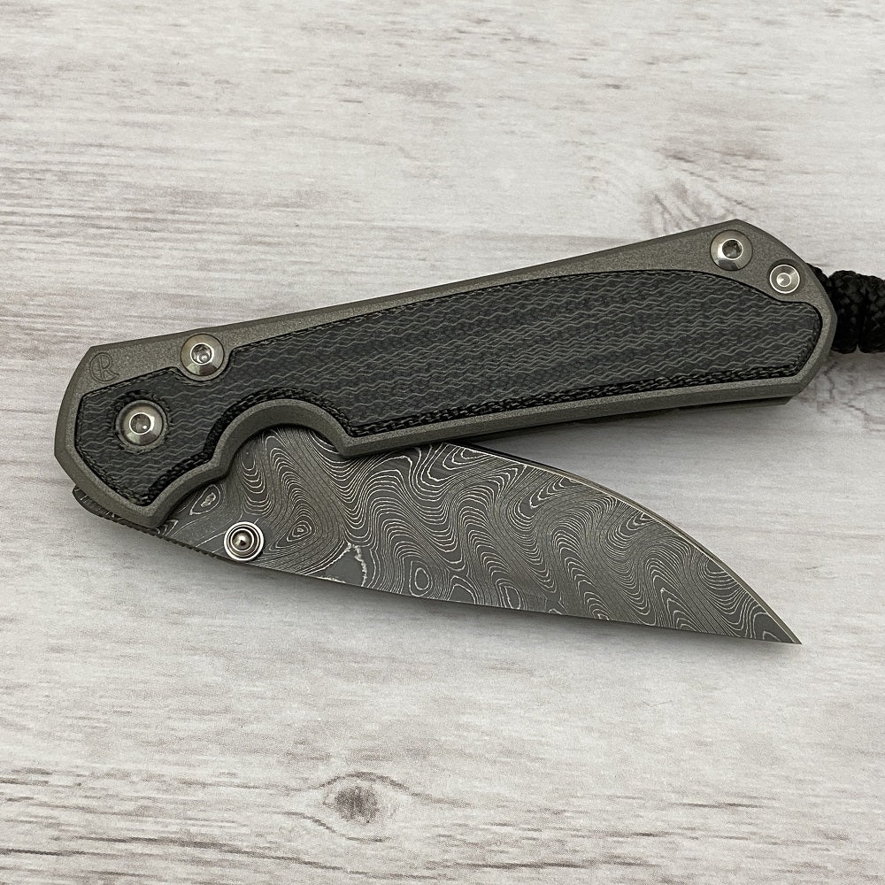 CHRIS REEVE SMALL SEBENZA 31 BLACK CANVAS MICARTA INLAY - BOOMERANG BLADE - SILVER DOUBLE THUMB LUGS