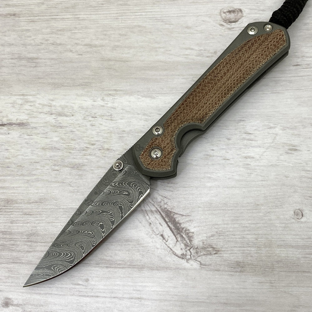 CHRIS REEVE SMALL SEBENZA 31 NATURAL CANVAS MICARTA INLAY - BOOMERANG BLADE - SILVER DOUBLE THUMB LUGS