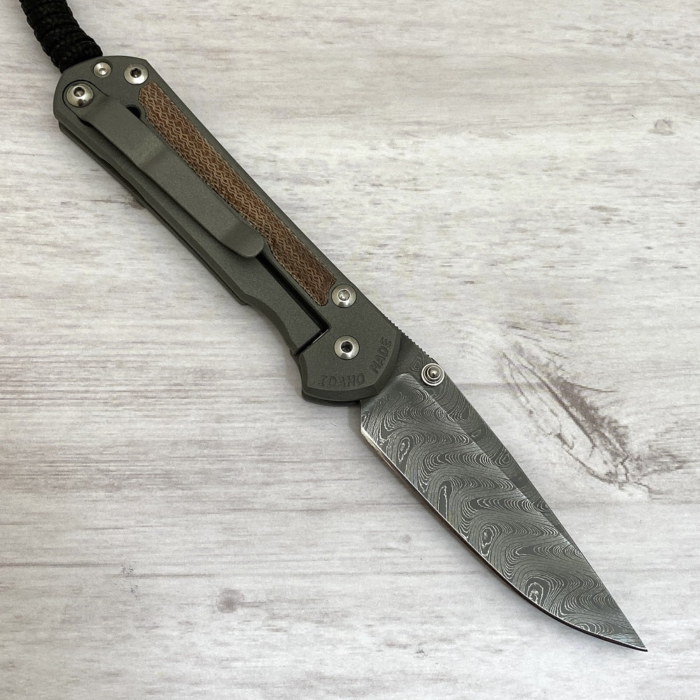 CHRIS REEVE SMALL SEBENZA 31 NATURAL CANVAS MICARTA INLAY - BOOMERANG BLADE - SILVER DOUBLE THUMB LUGS