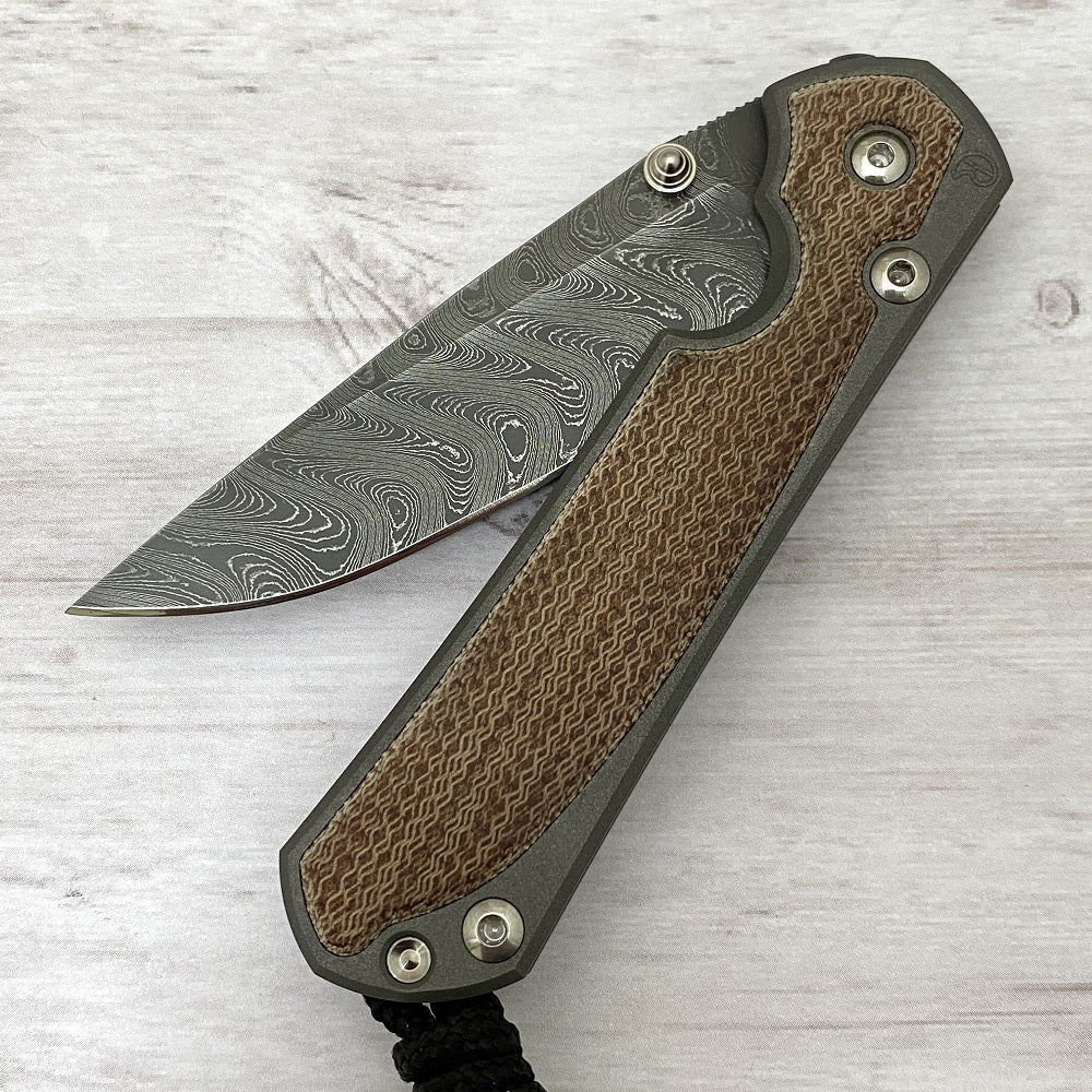 CHRIS REEVE SMALL SEBENZA 31 NATURAL CANVAS MICARTA INLAY - BOOMERANG BLADE - SILVER DOUBLE THUMB LUGS