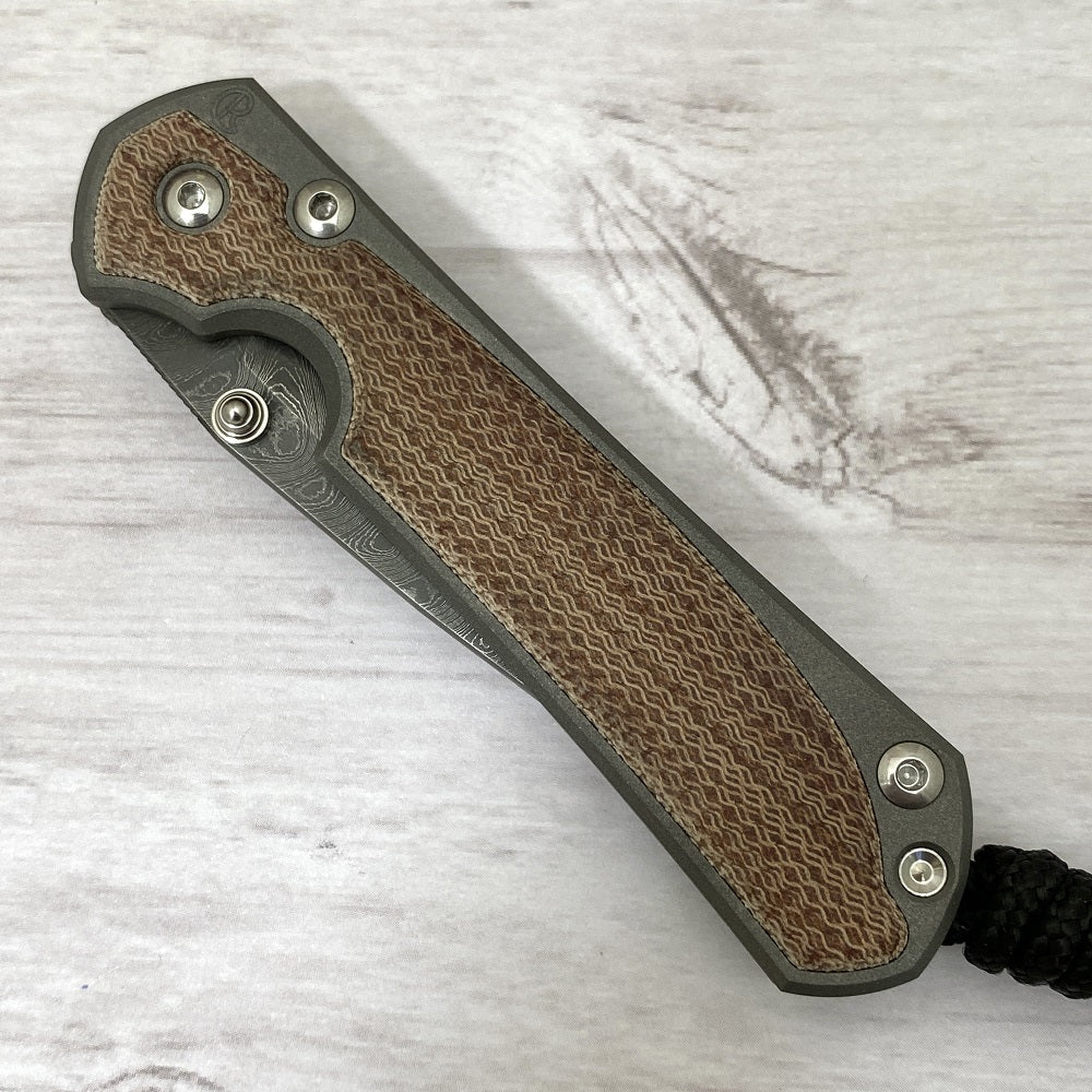 CHRIS REEVE SMALL SEBENZA 31 NATURAL CANVAS MICARTA INLAY - BOOMERANG BLADE - SILVER DOUBLE THUMB LUGS