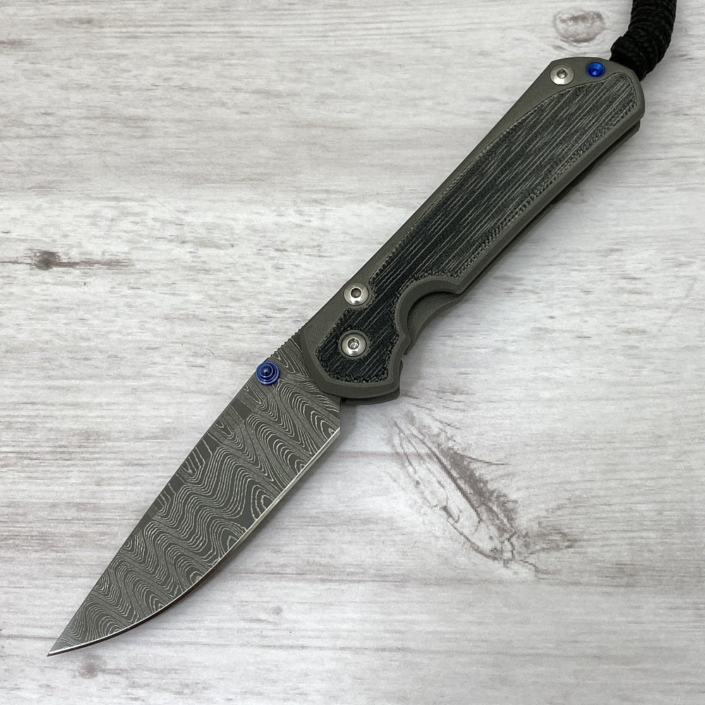 CHRIS REEVE SMALL SEBENZA 31 BLACK CANVAS MICARTA INLAY - LADDER BLADE - BLUE DOUBLE THUMB LUGS