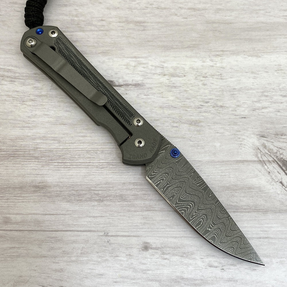 CHRIS REEVE SMALL SEBENZA 31 BLACK CANVAS MICARTA INLAY - LADDER BLADE - BLUE DOUBLE THUMB LUGS