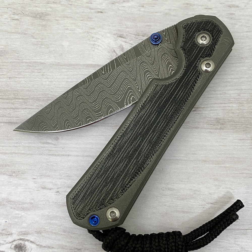 CHRIS REEVE SMALL SEBENZA 31 BLACK CANVAS MICARTA INLAY - LADDER BLADE - BLUE DOUBLE THUMB LUGS