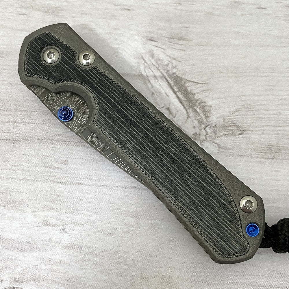 CHRIS REEVE SMALL SEBENZA 31 BLACK CANVAS MICARTA INLAY - LADDER BLADE - BLUE DOUBLE THUMB LUGS