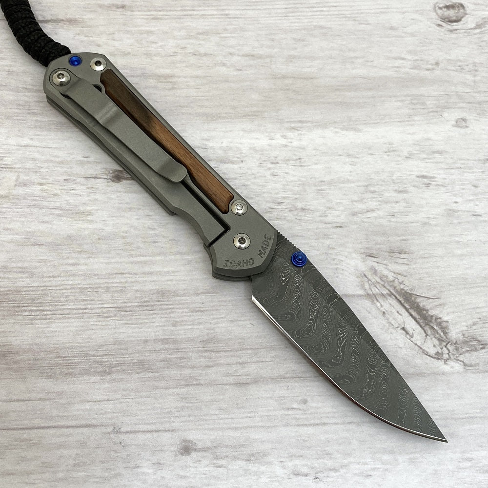 CHRIS REEVE SMALL SEBENZA 31 MACASSAR INLAY - BOOMERANG BLADE - BLUE DOUBLE THUMB LUGS