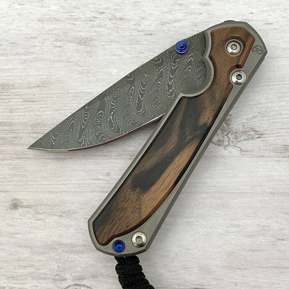 CHRIS REEVE SMALL SEBENZA 31 MACASSAR INLAY - BOOMERANG BLADE - BLUE DOUBLE THUMB LUGS