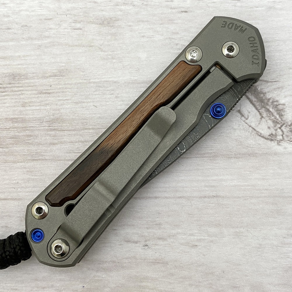 CHRIS REEVE SMALL SEBENZA 31 MACASSAR INLAY - BOOMERANG BLADE - BLUE DOUBLE THUMB LUGS