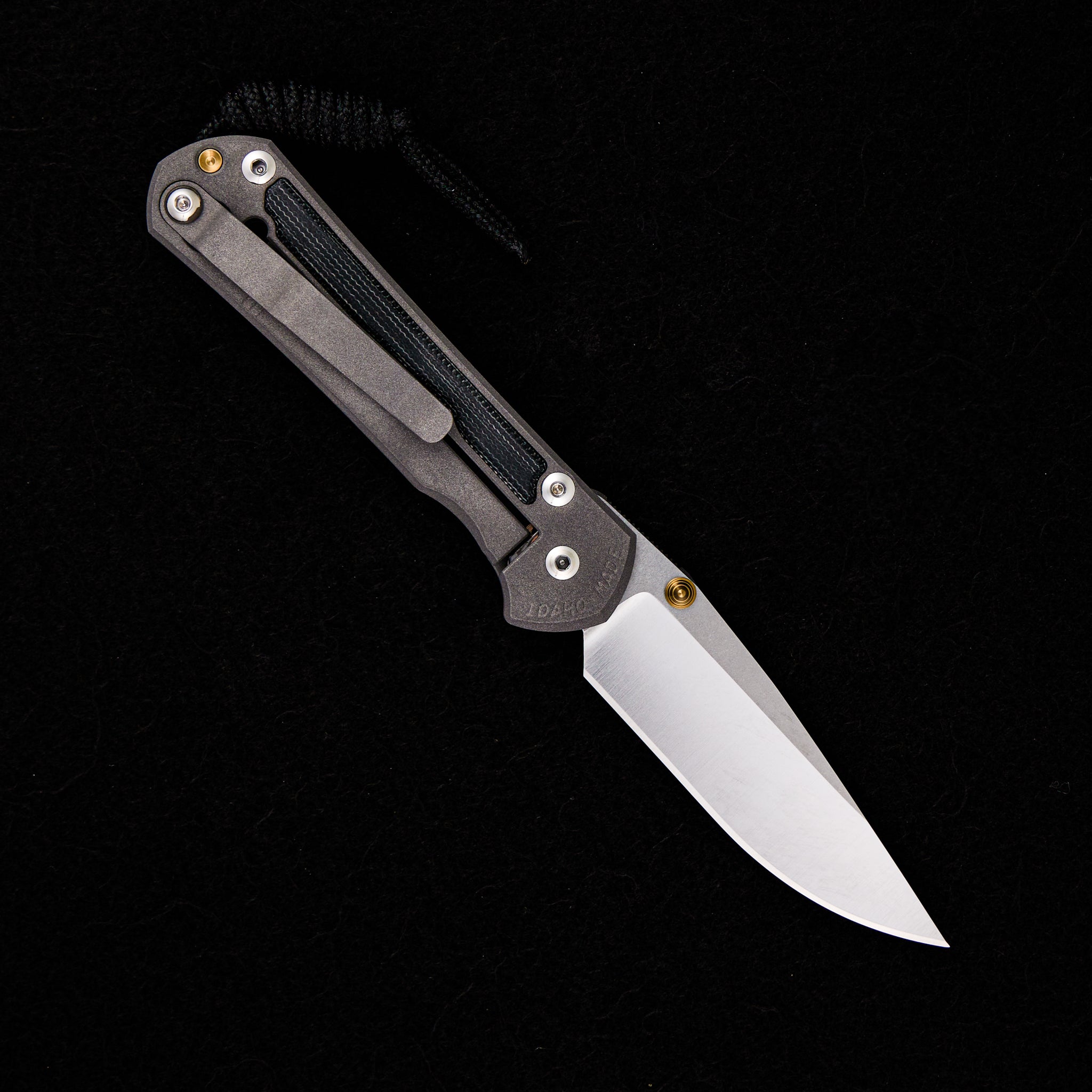 CHRIS REEVE SMALL SEBENZA 31 BLACK CANVAS MICARTA INLAY – POLISHED CPM MAGNACUT BLADE – GOLD DOUBLE THUMB LUGS